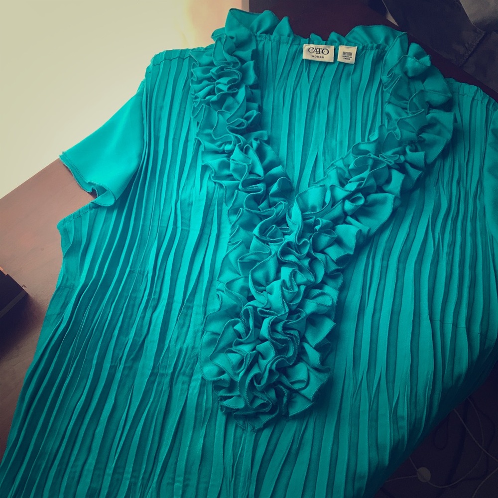 Turquoise colored blouse